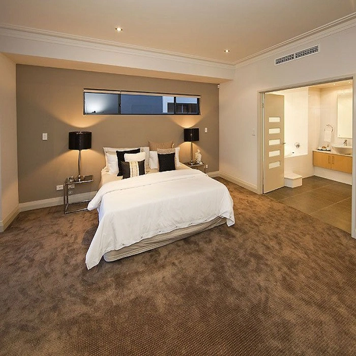 brown carpet bedroom